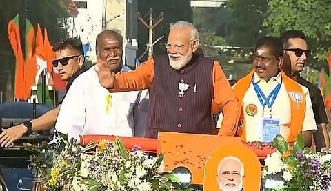 PM Modi arrives in Puducherry, commences roadshow