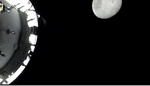 Artemis II breaks Apollo 13's distance record with daring moon flyby that included solar eclipse