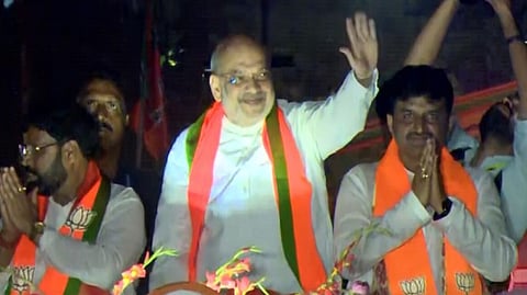 Amit Shah holds roadshow in Paschim Bardhaman during West Bengal campaign.
