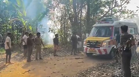 People gather at the site after the blast at a fireworks manufacturing unit in Mundathikode, Thrissur district, Kerala, Tuesday, April 21, 2026.