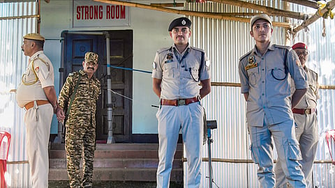 Security personnel guard a counting station on the eve of counting and results of the Assembly polls, Sunday, May 3, 2026.