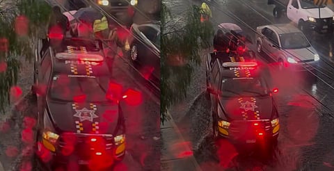 Policías rescatan a ciudadanos atrapados por fuertes lluvias en Morelia [VIDEO]