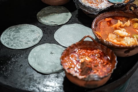 Enchiladas, maíz azul y antojitos acompañan la fiesta de la K’uínchekua