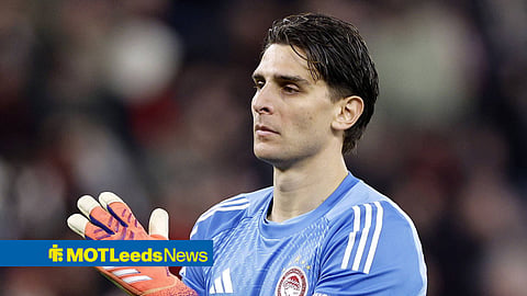 Konstantinos Tzolakis in action for Olympiacos