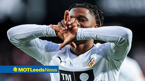 Largie Ramazani celebrating with Valencia