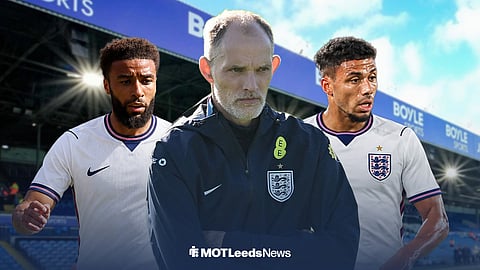 Leeds United defenders Jayden Bogle and James Justin in England shirts either side of England manager Thomas Tuchel