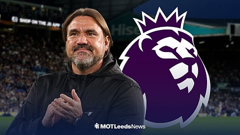 Daniel Farke smiling at Elland with Premier League Logo beside him