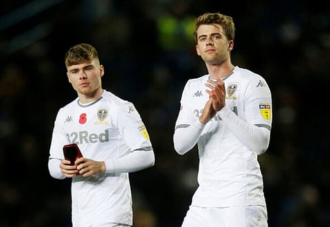 Soccer Football - Championship - Leeds United v Blackburn Rovers - Elland Road, Leeds, Britain - November 9, 2019  Leeds United's Patrick Bamford and Leif Davis after the match  Action Images/Ed Sykes  EDITORIAL USE ONLY. No use with unauthorized audio, video, data, fixture lists, club/league logos or "live" services. Online in-match use limited to 75 images, no video emulation. No use in betting, games or single club/league/player publications.  Please contact your account representative for further details.