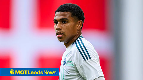 Shea Charles looking left while in action for Northern Ireland