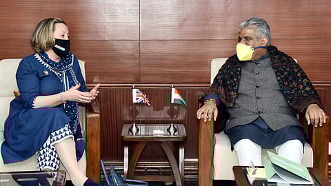 Britain's trade minister Anne-Marie Trevelyan meets Environment Minister Bhupender Yadav in New Delhi, India, Jan. 12, 2022.