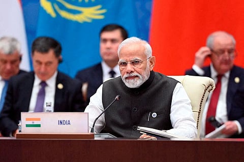 FILE PHOTO: Indian Prime Minister Narendra Modi attends an extended-format meeting of heads of the Shanghai Cooperation Organization (SCO) member states at a summit in Samarkand, Uzbekistan September 16, 2022. 