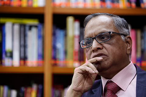 FILE PHOTO: N. R. Narayana Murthy, founder and chairman of Infosys, listens to a question during an interview with Reuters at the company's office in Bangalore February 28, 2012. Picture taken on February 28, 2012. 