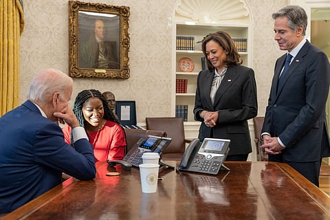 U.S. President Joe Biden and Cherelle Griner speak on the phone with WNBA basketball star Brittney Griner after her release by Russia, in this White House handout photo taken in the Oval Office, as Vice President Kamala Harris and U.S. Secretary of State Antony Blinken look on, at the White House in Washington, U.S. December 8, 2022. 