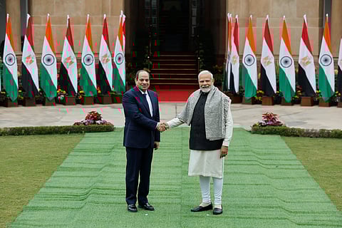 Egyptian President Abdel Fattah El Sisi shakes hands with Indian Prime Minister Narendra Modi before their meeting at the Hyderabad House in New Delhi, India, January 25, 2023. 