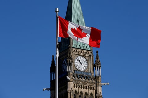 FILE PHOTO: A Canadian flag flies in front of the Peace Tower on Parliament Hill in Ottawa, Ontario, Canada, March 22, 2017. 