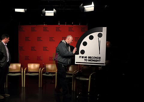 The clock with the Bulletin of the Atomic Scientists is being placed at a TV studio ahead of the announcement of the location of the minute hand on its Doomsday Clock, indicating what world developments mean for the perceived likelihood of nuclear catastrophe, at the National Press Club in Washington, U.S., January 24, 2023. 