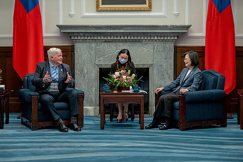 Taiwan President Tsai Ing-wen and Bob Stewart, British member of parliament (MP) and co-chair of the British-Taiwanese All-Party Parliamentary Group, speak during their meeting at the presidential office in Taipei, Taiwan, in this handout image released March 20, 2023. 