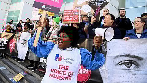 FILE PHOTO: Nurses protest during a strike by NHS medical workers, amid a dispute with the government over pay, outside University College London Hospital in London, Britain, February 6, 2023. 