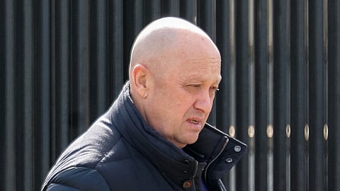 FILE PHOTO: Founder of Wagner private mercenary group Yevgeny Prigozhin leaves a cemetery before the funeral of Russian military blogger Maxim Fomin widely known by the name of Vladlen Tatarsky, who was recently killed in a bomb attack in a St Petersburg cafe, in Moscow, Russia, April 8, 2023. 