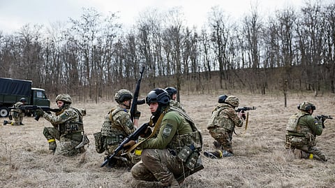Recruits of the Steel Border storm brigade practise at the unit's base in central Ukraine March 24, 2023. 