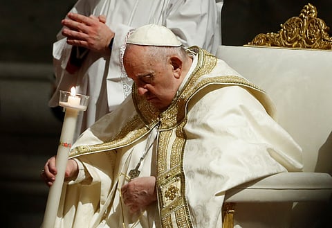 Pope Francis presides over the Easter Vigil in Saint Peter's Basilica at the Vatican, April 8, 2023. 