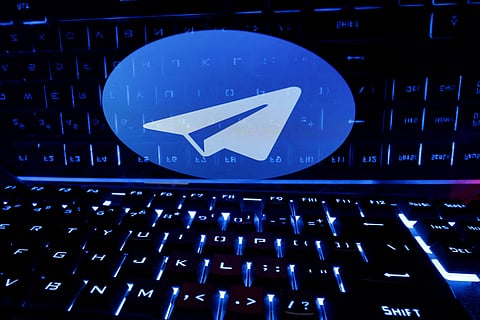 FILE PHOTO: A keyboard is placed in front of a displayed Telegram logo in this illustration taken February 21, 2023. 