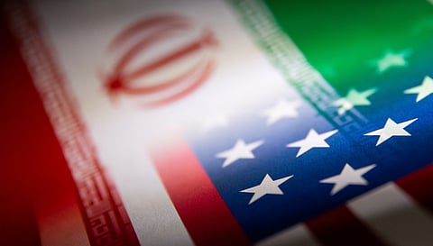 FILE PHOTO: Iran's and U.S.' flags are seen printed on paper in this illustration taken January 27, 2022. 