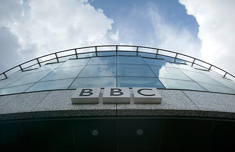 FILE PHOTO: Clouds pass over the BBC Television Centre, west London, April 2, 2004. 