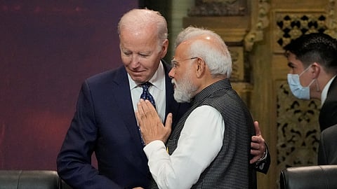 FILE PHOTO: U.S. President Joe Biden, left, and India Prime Minister Narendra Modi talks during the G20 leaders summit in Nusa Dua, Bali, Indonesia, Tuesday, Nov. 15, 2022. 