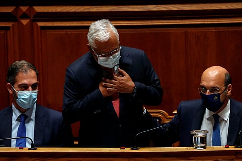 FILE PHOTO: Portugal's Prime Minister Antonio Costa gestures at the end of the debate on the 2022 state budget draft in first reading at the Portuguese Parliament in Lisbon, Portugal, October 27, 2021. 