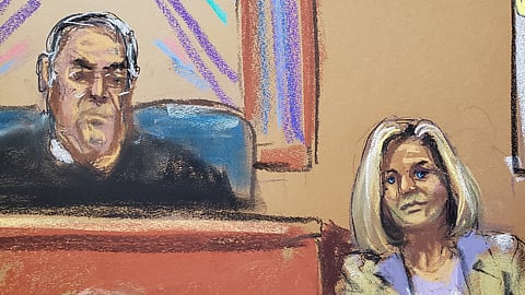 Former Bergdorf Goodman Women’s Store Manager Cheryl Beall answers questions next to U.S. District Judge Lewis Kaplan, during a civil trial to decide whether former U.S. President Donald Trump raped former Elle magazine advice columnist E. Jean Carroll in a Bergdorf Goodman department store dressing room in the mid-1990s, and defamed her by denying it happened, in New York, U.S., April 26, 2023 in this courtroom sketch.