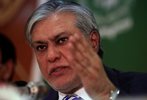 Pakistan's Finance Minister Ishaq Dar gestures during a news conference to announce the economic survey of fiscal year 2016-2017, in Islamabad, Pakistan, May 25, 2017. 