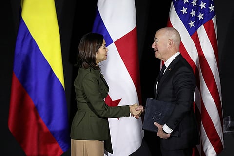 Panama's Foreign Minister Janaina Isabel Tewaney shakes hands with U.S. Homeland Security Secretary Alejandro Mayorkas after delivering a joint statement about migration, in Panama City, Panama April 11, 2023. 