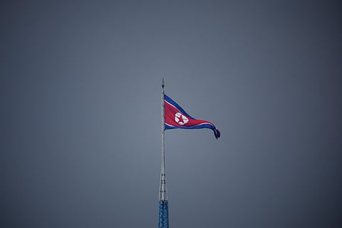 FILE PHOTO: A North Korean flag flutters at the propaganda village of Gijungdong in North Korea, in this picture taken near the truce village of Panmunjom inside the demilitarized zone (DMZ) separating the two Koreas, South Korea, July 19, 2022. 