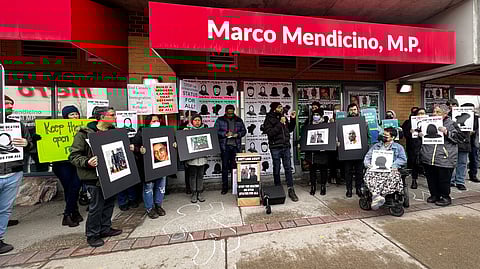 Protesters gather for Refugee Rights Day in front of Public Safety Minister Marco Mendicino's constituency in Toronto, Ontario, Canada, April 4, 2023. 