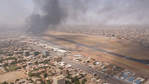 Smoke rises over the city as army and paramilitaries clash in power struggle, in Khartoum, Sudan, April 15, 2023 in this picture obtained from social media. 