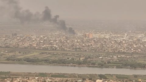 A drone view shows smoke rising over the Khartoum North Light Industrial Area, in Bahri, Sudan, April 23, 2023, in this still image taken from video obtained by Reuters. 