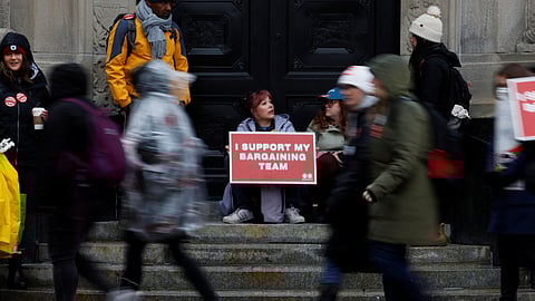 FILE PHOTO: Picketers gather and march downtown as approximately 155,000 public sector union workers with the Public Service Alliance of Canada (PSAC) continue to strike, in Ottawa, Ontario, Canada April 24, 2023.