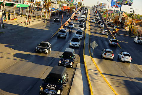 Hearses carrying the bodies of migrants from Guatemala and Honduras, who died in a detention center fire, on their way to the airport to be transferred to their places of origin in Ciudad Juarez, Mexico, April 11, 2023. 