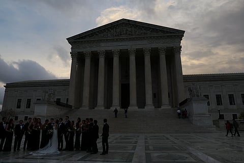 FILE PHOTO: The sun sets on the U.S. Supreme Court building after a stormy day in Washington, U.S., November 11, 2022. 