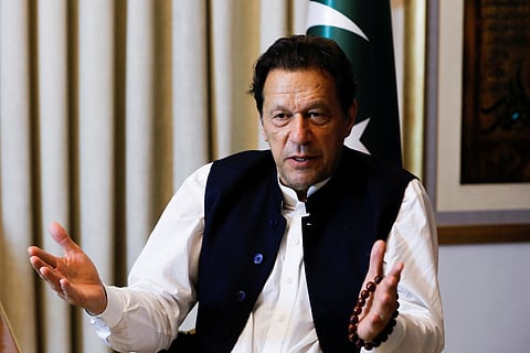 Former Pakistani Prime Minister Imran Khan, gestures as he speaks with Reuters during an interview, in Lahore, Pakistan March 17, 2023. 