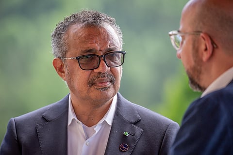 FILE PHOTO: World Health Organization Director-General Tedros Adhanom Ghebreyesus looks on as he speaks with the President of the European Council Charles Michel during the G7 leaders summit at Bavaria's Schloss Elmau castle, near Garmisch-Partenkirchen, Germany, June 27, 2022. 