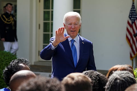 U.S. President Joe Biden waves after delivering remarks on "actions to advance environmental justice," prior to signing an executive order in the Rose Garden at the White House in Washington, U.S., April 21, 2023. 