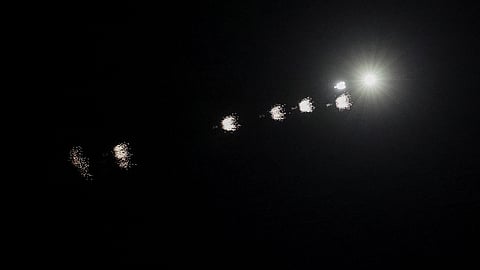 Traces of the explosions are seen in the sky over the city during a Russian drone strike, amid Russia's attack on Ukraine, in Kyiv, Ukraine May 3, 2023. 