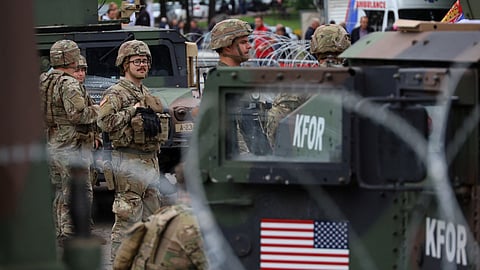 U.S. Kosovo Force (KFOR) soldiers, under NATO, stand guard near a municipal office in Leposavic, Kosovo May 31, 2023. 