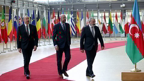 Azerbaijan's President Ilham Aliyev and Armenian Prime Minister Nikol Pashinyan are welcomed by European Council President Charles Michel in Brussels, Belgium May 14, 2023. 