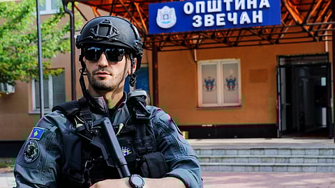 A member of Kosovo special police forces guards the municipal offices in Zvecan after ethnic Serb protestors tried to prevent a newly-elected ethnic Albanian mayor from entering the office in Zvecan, Kosovo, May 27, 2023.