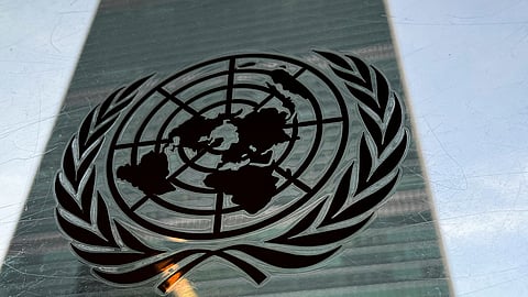 FILE PHOTO: The United Nations headquarters building is pictured with a UN logo in the Manhattan borough of New York City, New York, U.S., March 1, 2022. 