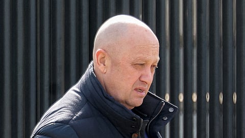 FILE PHOTO: Founder of Wagner private mercenary group Yevgeny Prigozhin leaves a cemetery before the funeral of Russian military blogger Maxim Fomin widely known by the name of Vladlen Tatarsky, who was recently killed in a bomb attack in a St Petersburg cafe, in Moscow, Russia, April 8, 2023. 