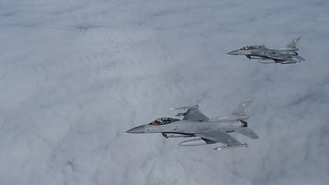 FILE PHOTO: F-16 aircrafts fly during a NATO media event at an airbase in Malbork, Poland, March 21, 2023. 